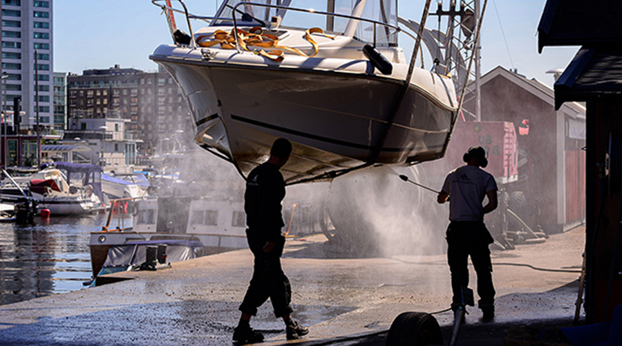 People washing a boat